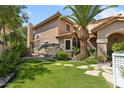 Landscaped backyard with stone path and mature plants at 514 S Marina Dr, Gilbert, AZ 85233