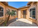 Charming courtyard entry with a stone-paved floor at 26562 W Vista North Dr, Buckeye, AZ 85396