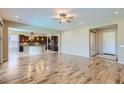 Spacious living area with hardwood floors and open floor plan at 26562 W Vista North Dr, Buckeye, AZ 85396