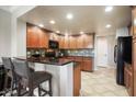 Modern kitchen with granite counters and ample cabinetry at 21320 N 56Th St # 2145, Phoenix, AZ 85054