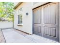 Private back entrance with double doors and a walkway at 4216 N 27Th St # 106, Phoenix, AZ 85016