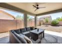 Covered patio with comfortable seating area, perfect for outdoor relaxation at 18229 E El Buho Pequeno --, Gold Canyon, AZ 85118