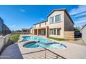 Relaxing kidney-shaped pool and spa at 26886 N 90Th Ave, Peoria, AZ 85383