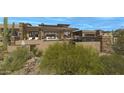 Stunning contemporary home boasting a private pool and serene desert landscaping at 39494 N 105Th St # 74, Scottsdale, AZ 85262