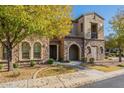 Two-story home with stone exterior and landscaped yard at 4777 S Fulton Ranch Blvd # 2071, Chandler, AZ 85248