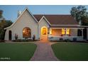 Charming craftsman home with front porch and brick pathway at 1547 W Vernon Ave, Phoenix, AZ 85007
