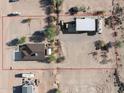 Aerial view of house and surrounding land at 32828 N 228Th Dr, Wittmann, AZ 85361