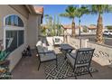 Inviting front patio with seating area, perfect for relaxing outdoors at 1509 E Peach Tree Dr, Chandler, AZ 85249