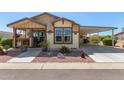 Charming single-story home with covered carport and well-maintained landscaping at 437 E Germann Rd # 95, San Tan Valley, AZ 85140