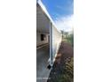 Covered carport with metal privacy screen at 120 N Val Vista Dr # 86, Mesa, AZ 85213