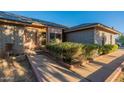 Brick home with a walkway leading to the front entrance at 7601 N Citrus Rd, Waddell, AZ 85355