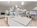 Modern kitchen with island and pendant lighting at 17871 E Paria Canyon Dr, Rio Verde, AZ 85263