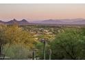 Scenic view of mountain range and residential area at 42035 N 113Th Way, Scottsdale, AZ 85262