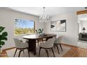 Dining room featuring an oval wooden table and chandelier at 8420 N 15Th St, Phoenix, AZ 85020