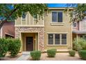 Two-story house with stone accents and landscaping at 4386 E Selena Dr, Phoenix, AZ 85050