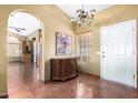 Bright entryway with tile floors and view of kitchen at 10918 E San Tan Blvd, Sun Lakes, AZ 85248