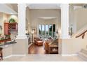 Spacious living room with hardwood floors and large windows at 26348 N 104Th Way, Scottsdale, AZ 85255