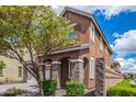 Two-story house with a side view of the house at 7311 N 90Th Ave, Glendale, AZ 85305