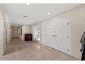 Bright entryway with tile flooring and double doors at 6516 E Maverick Rd, Paradise Valley, AZ 85253