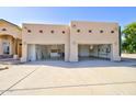 Three-car garage with ample storage space at 19999 W Fawny Ln, Casa Grande, AZ 85122