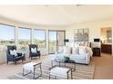 Spacious main bedroom with sitting area and stunning views at 10648 E Greythorn Dr, Scottsdale, AZ 85262