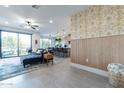 Open concept living area with kitchen and dining area at 142 E Hearne Way, Gilbert, AZ 85234
