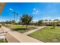 Inviting community courtyard with lush landscaping and seating areas at 14020 N Thunderbird Blvd, Sun City, AZ 85351