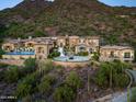 Luxury estate home with a large pool and mountain views at 11200 E Canyon Cross Way, Scottsdale, AZ 85255