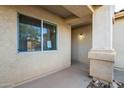 Inviting front entrance with a covered porch and a light fixture at 4603 E Superior Rd, San Tan Valley, AZ 85143