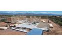 New home construction site showing framing and foundation at 28021 N 156Th St, Scottsdale, AZ 85262