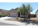 Single-story house with a two-car garage and desert landscaping at 31021 W Columbus Ave, Buckeye, AZ 85396