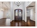 Elegant entryway with double doors and hardwood floors at 6120 N 31St Ct, Phoenix, AZ 85016