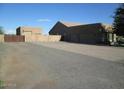 Long driveway leading to a large home with attached garage at 38507 N 27Th Ave, Phoenix, AZ 85086