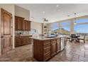 Island kitchen with stainless steel appliances and mountain views at 127 E Sabrosa Dr, New River, AZ 85087