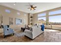Living room with mountain views and tiled floors at 127 E Sabrosa Dr, New River, AZ 85087