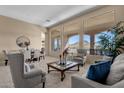 Spacious living area with mountain views and ample natural light at 127 E Sabrosa Dr, New River, AZ 85087