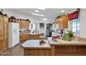 Spacious kitchen with light wood cabinets at 437 E Germann Rd # 146, San Tan Valley, AZ 85140