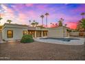 Luxury home backyard with a pool and patio at 8513 E Belgian Trl, Scottsdale, AZ 85258
