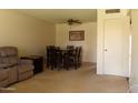 Dining area features a table and chairs, great for Gathering meals at 10851 W Santa Fe Dr, Sun City, AZ 85351