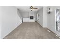 Living room with tile floor, fireplace and staircase at 1081 W 1St St # 7, Tempe, AZ 85281