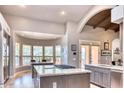 Gourmet kitchen with granite island and bay window at 7101 E Berneil Ln, Paradise Valley, AZ 85253