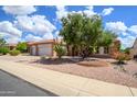 Lovely two-car garage home with mature landscaping at 17621 N Eagle Crest Dr, Surprise, AZ 85374