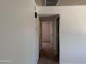 Hallway with doors to bedrooms at 700 W University Dr # 203, Tempe, AZ 85281