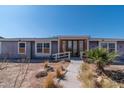 House exterior with a covered entryway and walkway at 3718 S 379Th Ave, Tonopah, AZ 85354