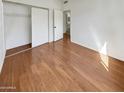 Bright bedroom with hardwood floors and spacious closet at 2970 N Oregon St # 10, Chandler, AZ 85225