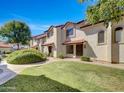 Two-story building with Spanish-style architecture and manicured lawn at 2970 N Oregon St # 10, Chandler, AZ 85225