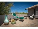 Relaxing patio with seating area and mountain views at 5960 E Grapevine Rd, Cave Creek, AZ 85331