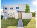 Building exterior with walkway and wooden gate at 5204 N 42Nd Ln, Phoenix, AZ 85019