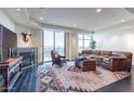 Living room with leather furniture and fireplace at 2211 E Camelback Rd # 505, Phoenix, AZ 85016
