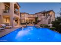 Luxury pool and spa with stunning night views at 9848 E Parkside Ln, Scottsdale, AZ 85255